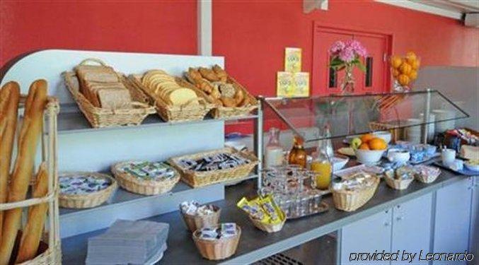 里昂中心鲁塞十字酒店 餐厅 照片
